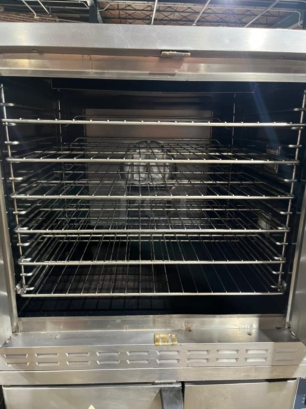 Alto-Shaam Platinum Series ASC-4G convection oven, stainless steel, natural gas, double stacked, thermostatic controls, racks included.