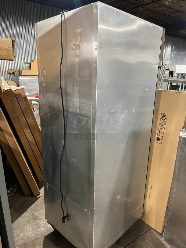 True TG1R-1S commercial stainless steel refrigerator, single door, with poly-coated rack, 115V, on casters.