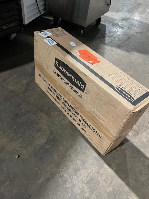 NEW Rubbermaid Commercial 2-Tier Pushcart in box, Model FG9T6600BLA, visible label with product details, pristine condition.