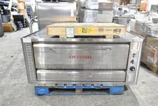 Blodgett 1048B stainless steel single deck pizza oven, natural gas powered, excellent condition, visible brand label.