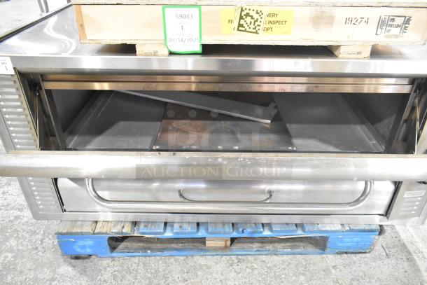 Blodgett 1048B stainless steel commercial pizza oven, natural gas-powered, single deck, clean condition, visible tags.