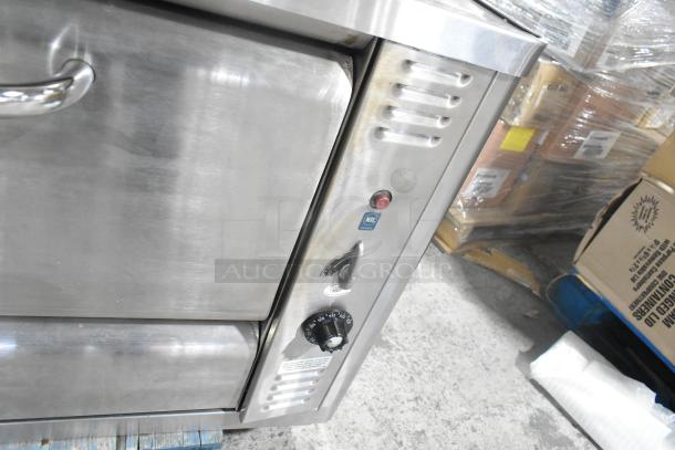 Blodgett 1048B stainless steel commercial pizza oven, natural gas, single deck, features control panel with temperature dial, used condition.
