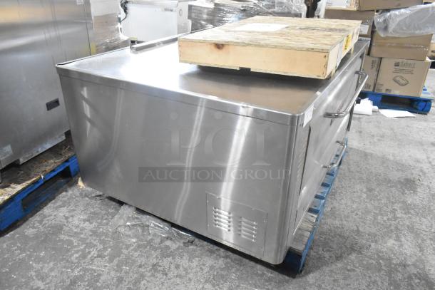 Blodgett 1048B stainless steel commercial single deck pizza oven, natural gas powered, in good condition.