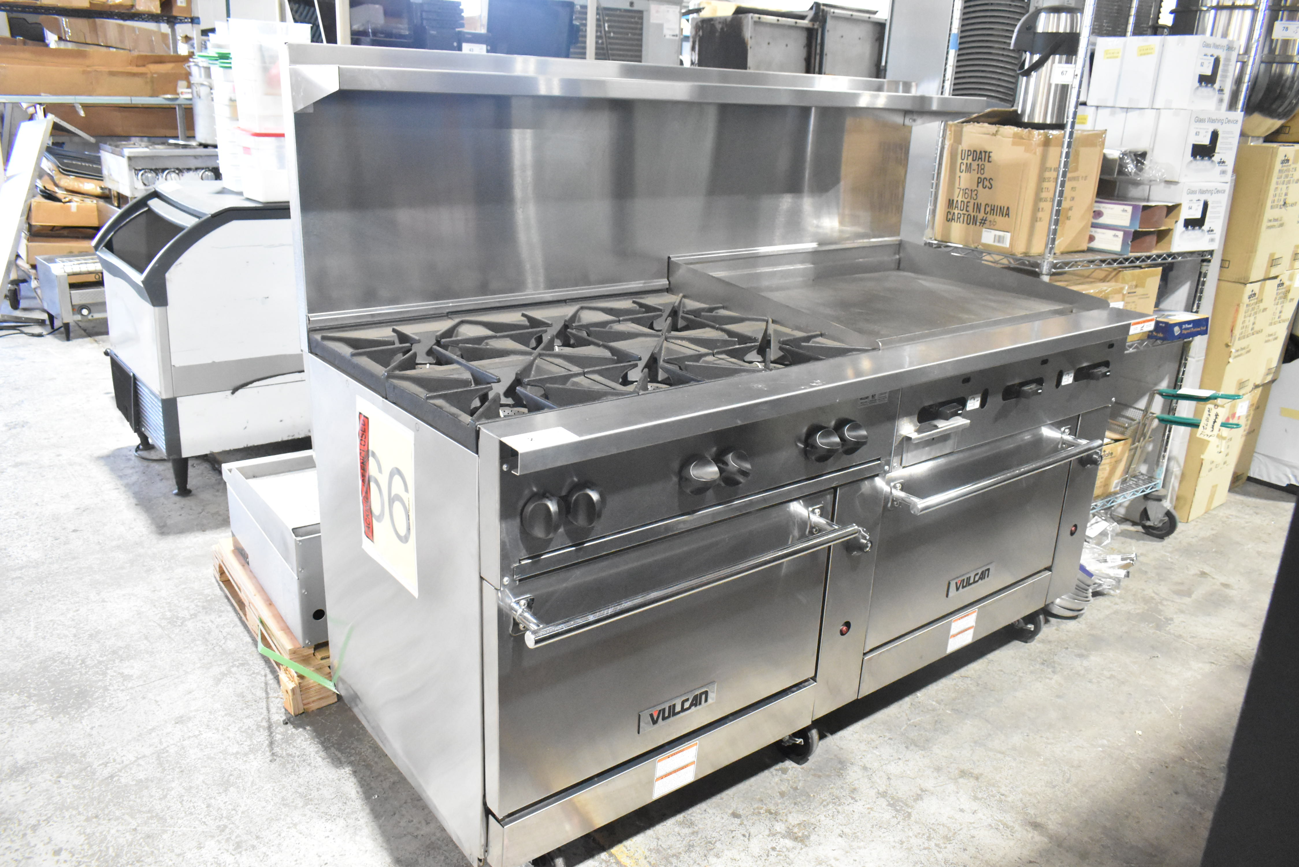 Brand new Vulcan commercial 6-burner range with flat top griddle and double oven - the restaurant industry workhorse