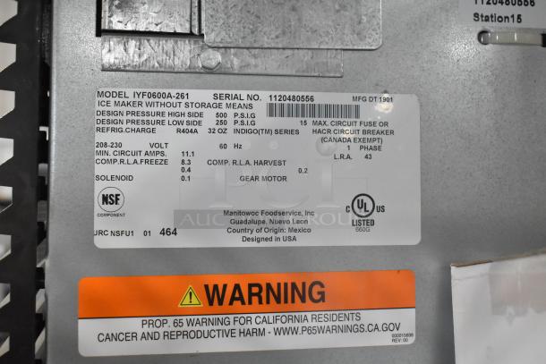 2019 Manitowoc IYF0600A-261 ice head with SPA310 dispenser, stainless steel, 208-230V, 1 phase, model and safety labels visible.