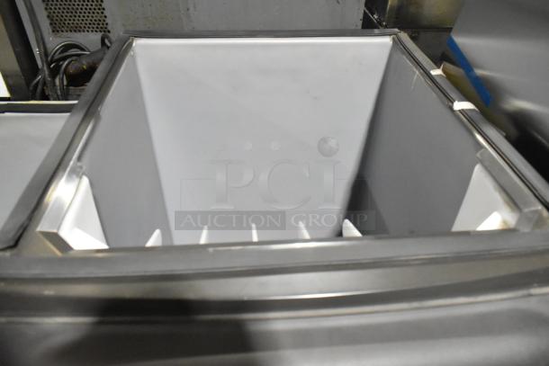 Brand new Manitowoc B320 stainless steel ice bin, 210 lb capacity, commercial use, scratch and dent condition.
