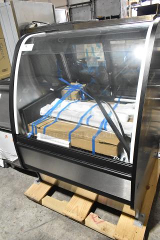 Brand new 2021 True TGM-R-36-SC/SC-S-S R/LK NS bakery case with curved glass, showcasing packaging inside. 115 Volts, 1 Phase.