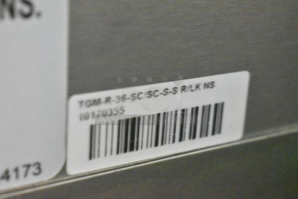 Barcode label on a 2021 True TGM-R-36-SC/SC-S-S R/LK NS bakery case. Model and serial number visible.