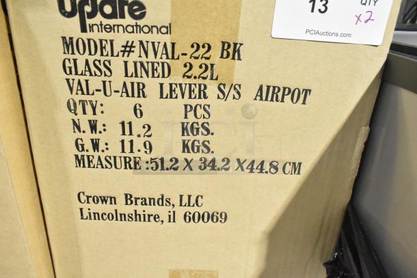 2 boxes of 6 new Update NVAL-22BK 2.2L Val-U-Air stainless steel coffee air pots. Glass-lined. Auction lot label visible.