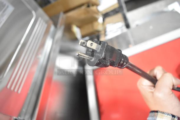 Avantco 177HTIS1812 Undercounter Heated Holding Cabinet, solid door, on casters, 120V plug shown, new condition.