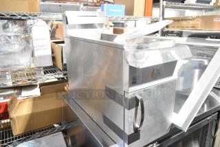 BRAND NEW 2025 Cooking Performance Group FCPG15 Natural Gas Fryer, 15 lb., 26,500 BTU, with metal fry basket, minor dents.