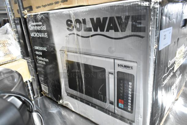 Boxed Solwave 180MW1800TH commercial microwave with 1.2 cu. ft. interior, push button controls; new with scratches and dents.