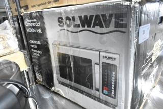 Boxed Solwave 180MW1800TH commercial microwave with 1.2 cu. ft. interior, push button controls; new with scratches and dents.