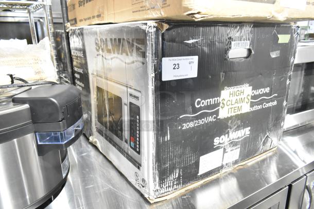 Brand new Solwave 180MW1800TH commercial microwave in original box with minor scratches, large 1.2 cu. ft. interior.