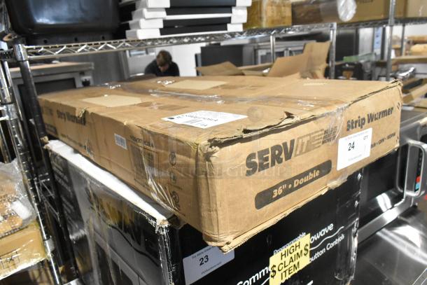 New ServIt 423SW36TLHDBLA 36" lighted double strip warmer, dual toggle controls. Box is scratched and dented. 120V, 1 phase.