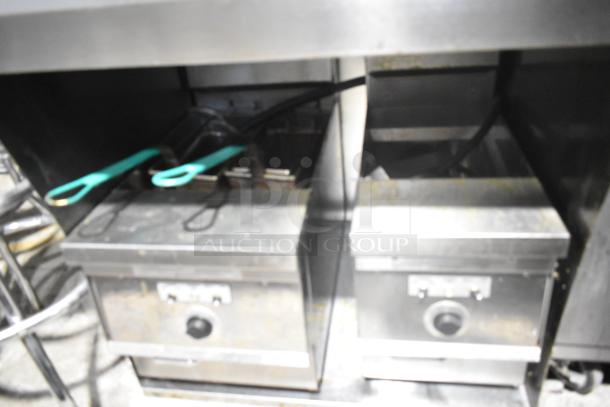 Giles GVH-C Stainless Steel Ventless Hood System, featuring electrostatic air cleaner. Visible handles and controls. 208-240V, 1 Phase.