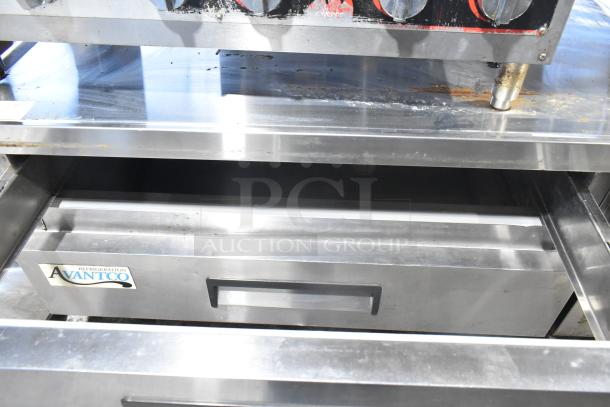 Avantco stainless steel 2-drawer chef base on commercial casters, 115V, shows Avantco label, good condition.