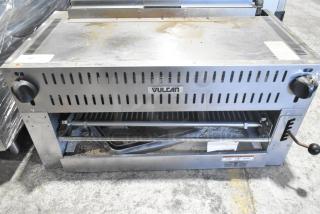 Vulcan Stainless Steel Commercial Cheese Melter in good condition, visible branding. Suitable for professional kitchens.
