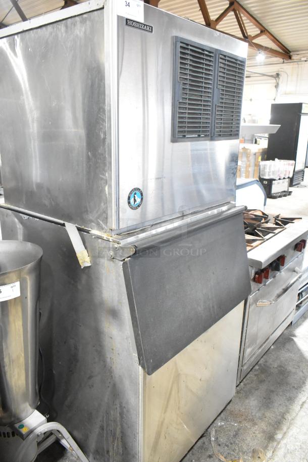 Hoshizaki KML-631MAH stainless steel commercial ice head on Hoshizaki B-500SF bin, 208-230 volts, 1 phase, showing signs of use.