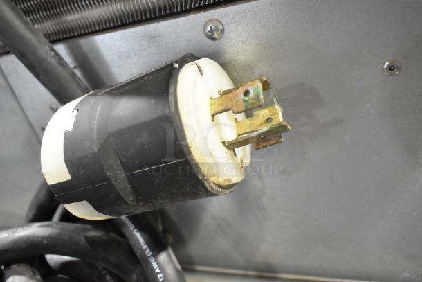 Hoshizaki KML-631MAH Ice Head plug, 208-230V, used condition. Close-up of electrical connector and wiring detail.