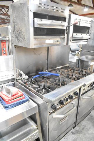 Tri-Star TSR-1 stainless steel 4-burner range with oven, salamander cheese melter, and backsplash. Commercial-grade, natural gas.