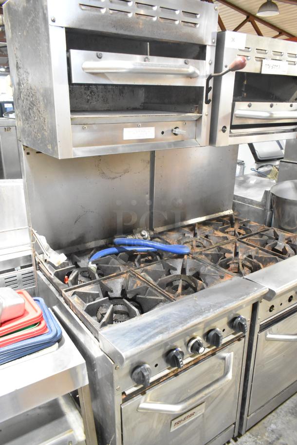 Tri-Star TSR-1 stainless steel 4 burner range with oven, salamander cheese melter, and backsplash. Used condition.