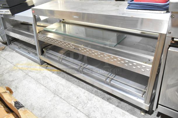 Hatco GRHD-4PD metal countertop 2-tier warming display case, 120/240 volts, 1 phase, showing wear, with glass shelving.