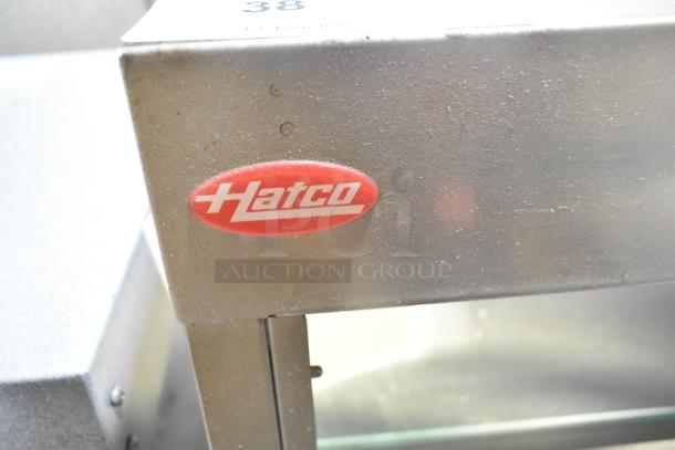 Hatco GRHD-4PD metal countertop 2-tier warming display case in used condition with visible brand logo. 120/240V, 1 Phase.