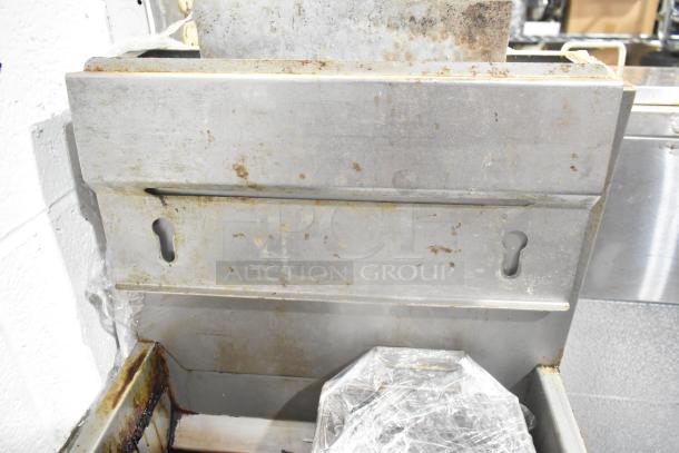 Vulcan LG300-1 stainless steel deep fat fryer, natural gas, 90,000 BTU, includes 2 metal fry baskets, visible wear.