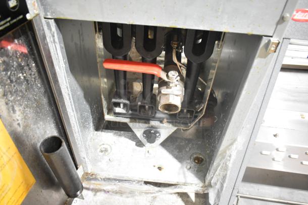 Vulcan LG300-1 stainless steel natural gas fryer, 90,000 BTU, floor style, includes 2 metal fry baskets, visible controls.