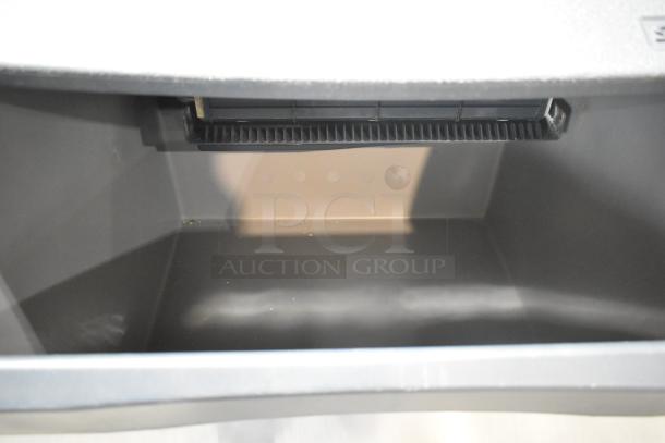 2018 Scotsman CU1526MA-1E ice machine interior, showing well-maintained, clean stainless steel compartment.