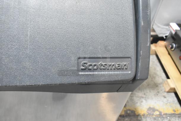 2018 Scotsman CU1526MA-1E stainless steel ice machine, 115V, 1 Phase. Features self-contained design. Scotsman logo visible.