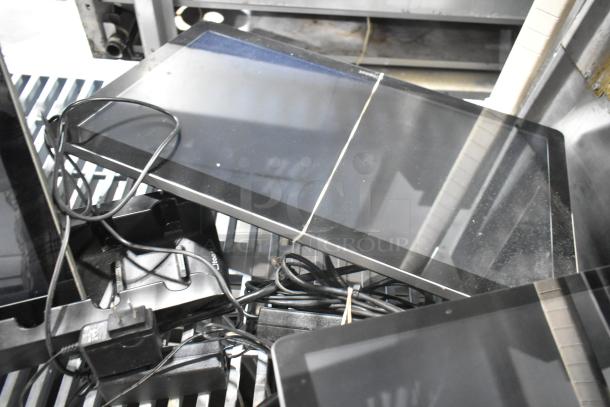 Three POS monitors with power cords, black frames, in good condition, bundled together for auction.