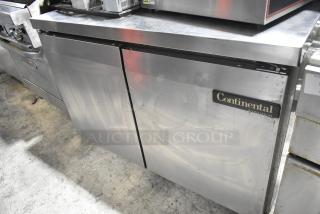 Continental SW48-AS stainless steel 2-door undercounter cooler. Features visible branding, commercial quality. 115 volts, 1 phase.