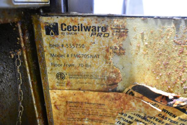Cecilware Pro FMS705NAT stainless steel gas fryer, 70 lb capacity, visible rust, model label shows specifications.