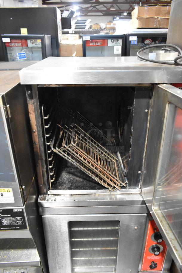 Vulcan stainless steel commercial gas convection oven, half size, used condition, includes interior racks.