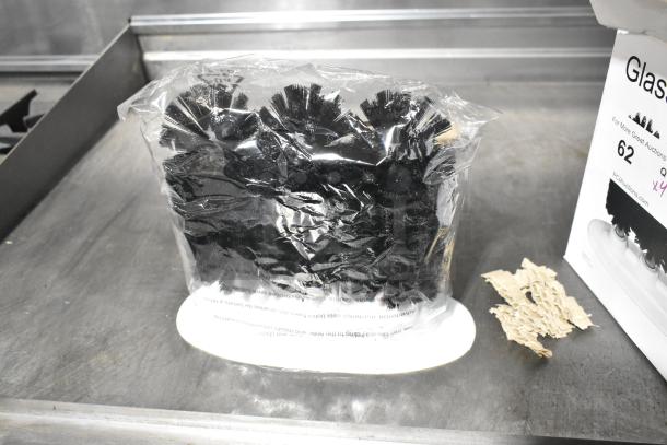 Brand new Update GWD-3 glass washing device in original packaging, featuring three black brushes in a sealed bag.