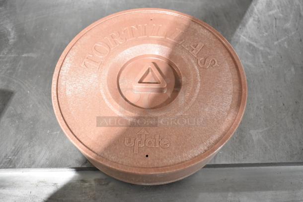 Brand new Update Tortilla Warmer in brown with "TORTILLAS" and "update" embossed on the lid. Brand new condition.