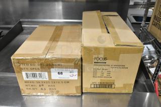 Two sealed boxes labeled Focus 900408 8" Springform Flat Pan and DPS-20 Digital Portion Scales, new condition.