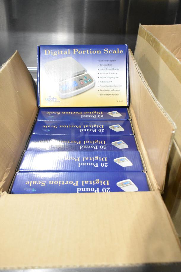 Box of brand new DPS-20 Digital Portion Scales, 20 lb capacity, compact size, LCD display, auto features, in packaging.