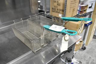 Two new metal fry baskets with teal handles, labeled "73 QTY X2," slight scratches and dents. China made.