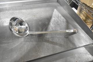 Stainless steel ladle, Update LOP-1813 model, new with minor scratches. Durable design, barcode on handle. 23 per bid.