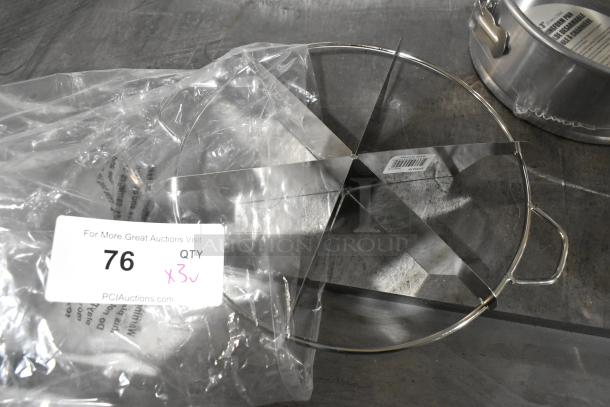 3 brand new scratch and dent items: 2 springform baking pans, pie cutter, wrapped in plastic, labeled quantity 3.