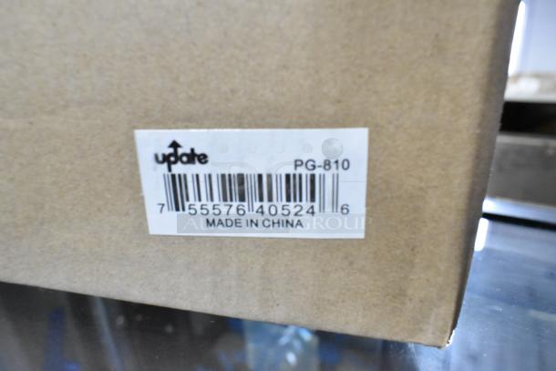 Box label showing Update PG-810, Made in China. Contains Update TD-MFOLD dispenser and PG810 wire pan grate, brand new.