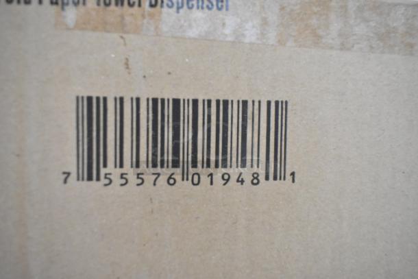 Barcode and partial text indicating "Paper Towel Dispenser" on cardboard packaging.
