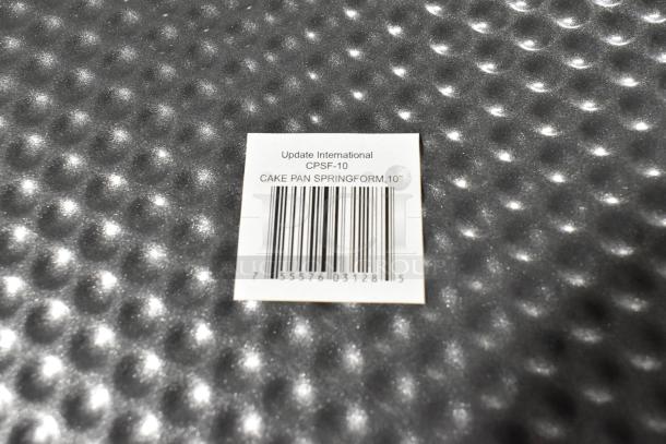 2 new Update CPSF-10 10" springform metal baking pans; label shows brand and barcode.