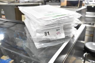 15 brand new Update S69-6RD fire extinguisher signs in packaging. Quantity label shows "QTY x15."