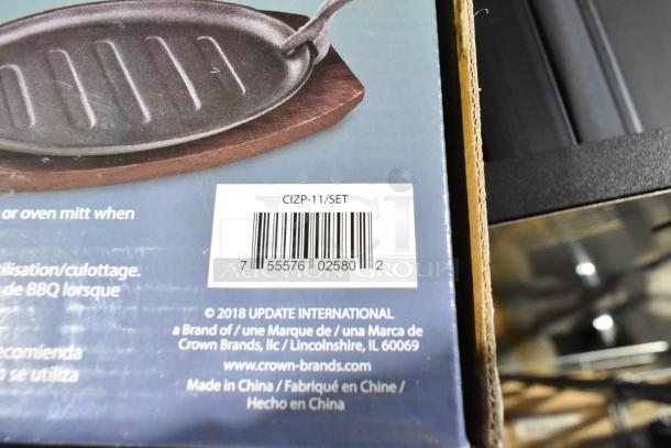 13 new Cast Iron Fajita Platter Sets in box, model CIZP-11/SET, by Update International, made in China.