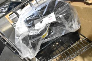 New Update TD-MFOLD surface mount paper towel dispenser in packaging; holds multifold towels; qty 2.