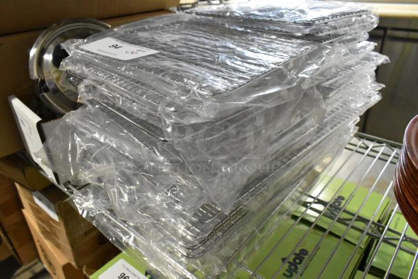 Brand new Update PG810 1/2 size wire pan grates, stacked and sealed in plastic. Perfect condition, 30 count.